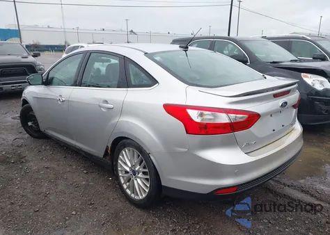 2014 Ford Focus Titanium from USA, damaged, VIN 1FADP3J23EL286078